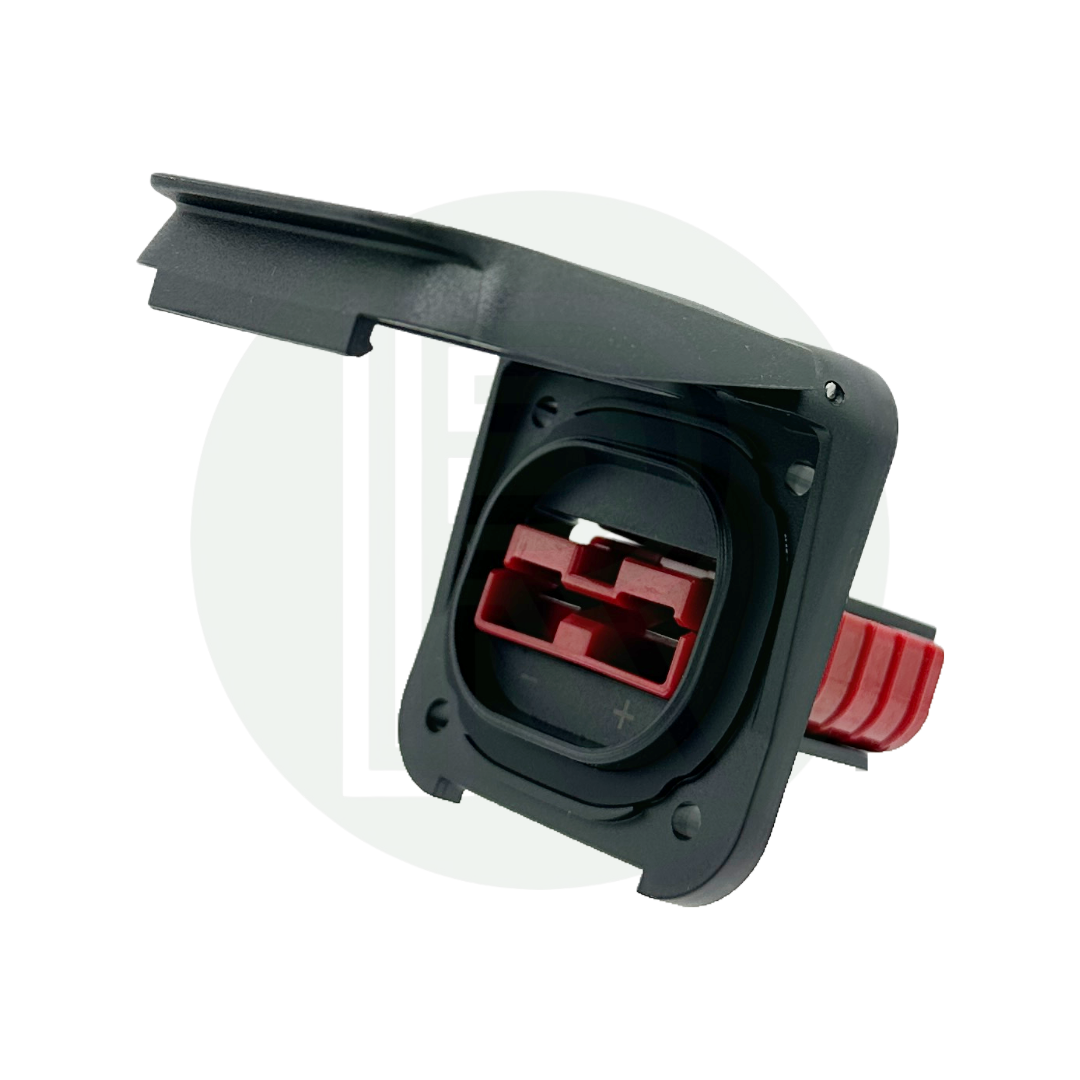 Angled front view of Anderson solar connection with open lid revealing red connector and polarity markings.