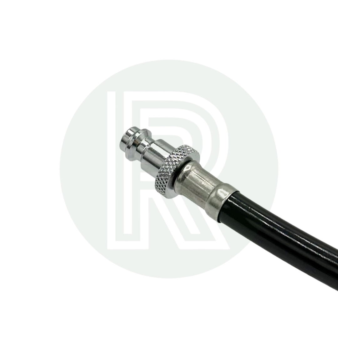 Stainless steel hose connector attached to black hose, showing quick-connect fitting detail.