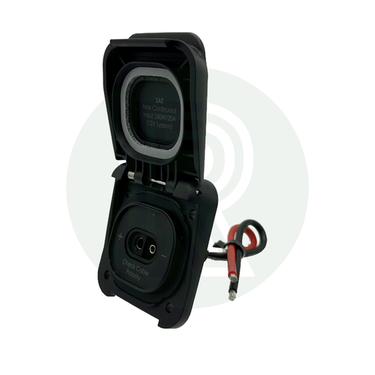 Open waterproof SAE solar socket showing internal connection port and labeled polarity indicators.