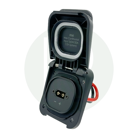 Angled front view of XT60 solar connection with open lid revealing internal connector and polarity markings.