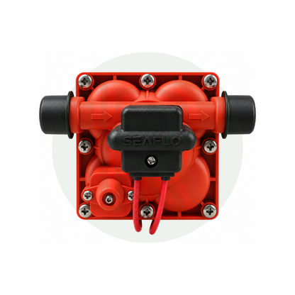 Close-up of Seaflo Series 42 water pump red diaphragm head showing inlet and outlet ports.